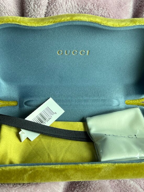 Authentic Gucci GG1163S aviator sunglasses in gold with grey lenses.